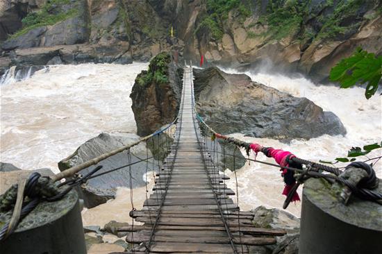 A bridge over a rough river